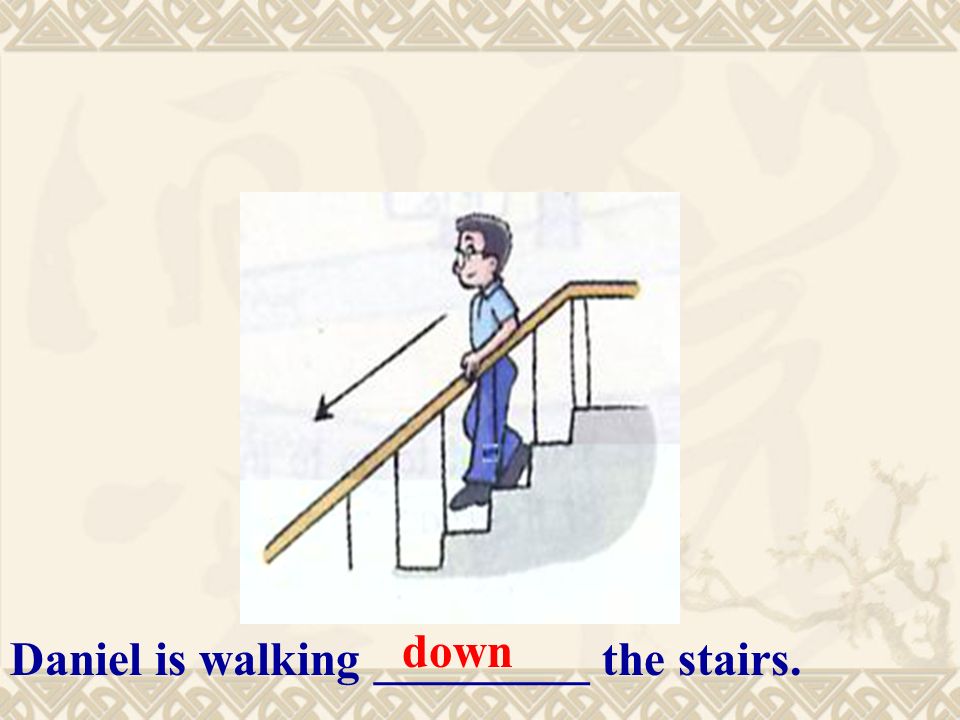 Daniel is walking _________ the stairs. down